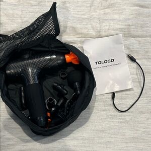 Black and Orange Massage Gun
